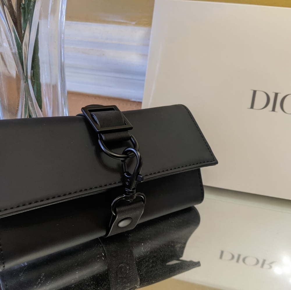 - Dior pouch